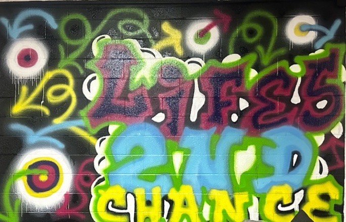 Inspiring Change and Expression: Jewelz Creation’s Mural at Life’s Second Chance Treatment Center,  a Vivid Celebration of Hope, Healing and Renewal.